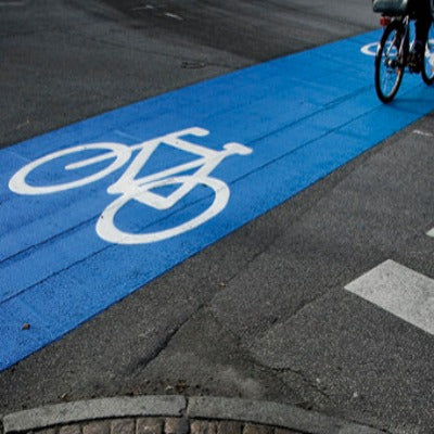 Blue cycle lane marked using chlorinated rubber line marking paint
