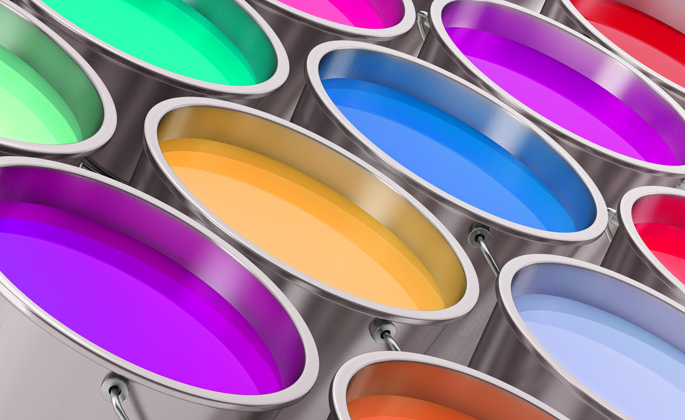 Tins of coloured paint
